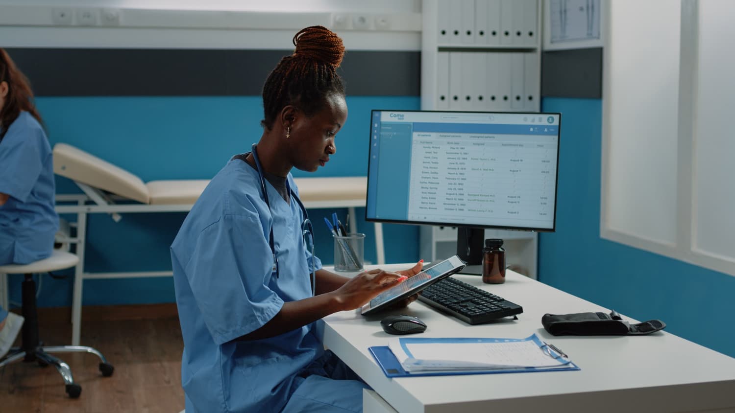 Healthcare team coordinating care and operations at a nurse station